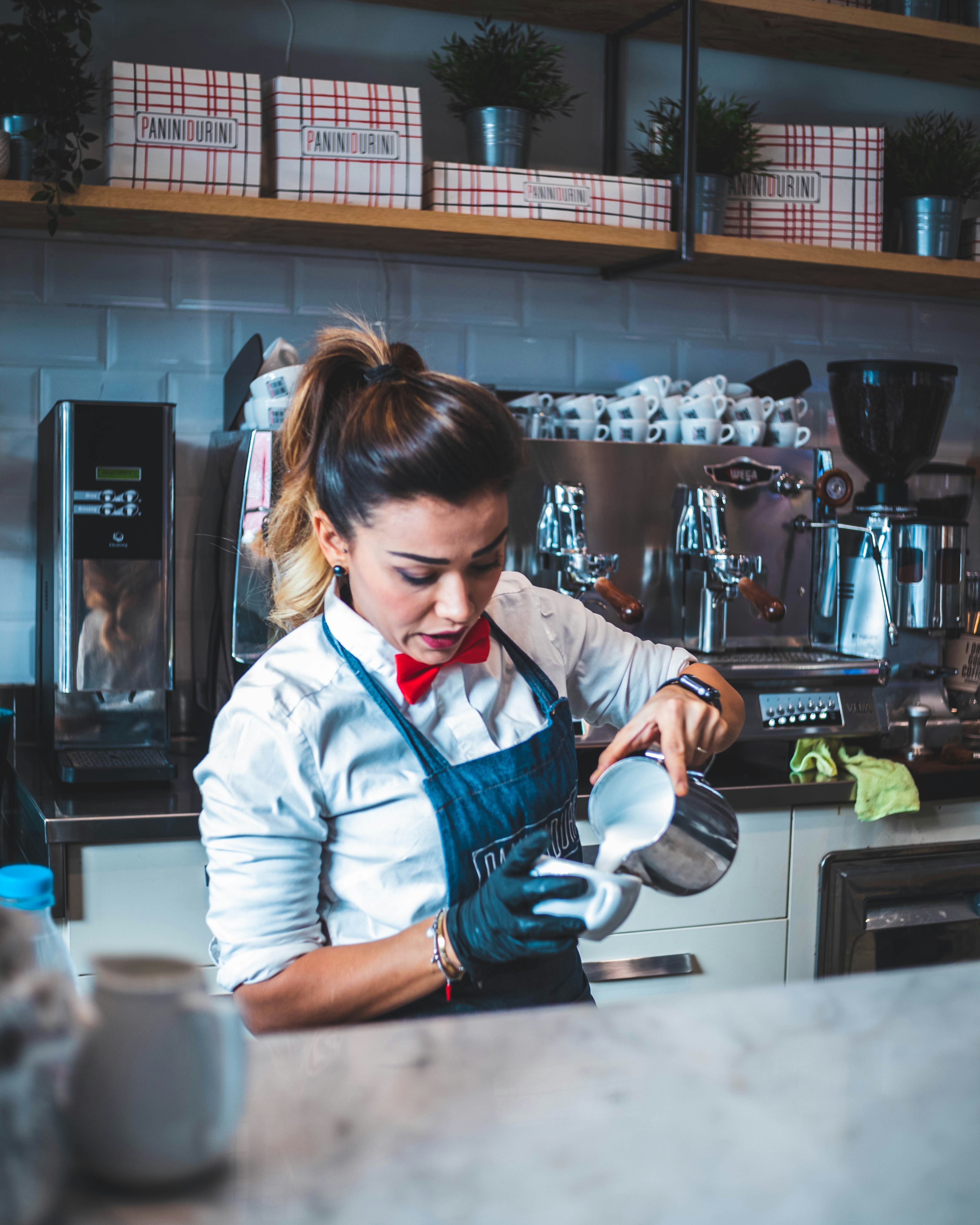 Coffee Shop Owner Serves Coffee